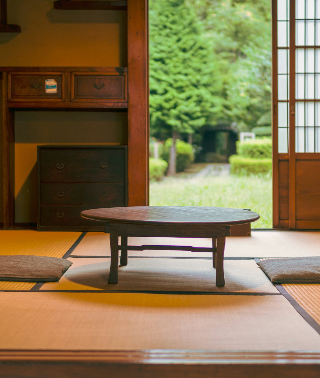 Japanese tatami room opening to a garden